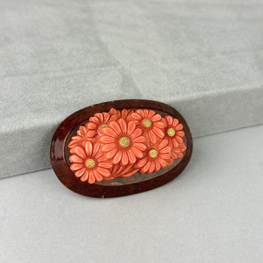 Vintage Coral Celluloid Daisies on Wood Brooch