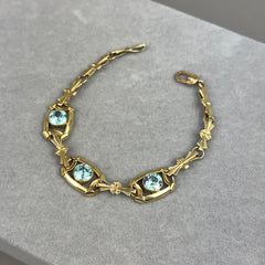 Vintage 1940s Retro Ribbon Link Bracelet in 14k Gold with Blue Zircon