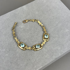 Vintage 1940s Retro Ribbon Link Bracelet in 14k Gold with Blue Zircon