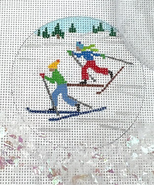 Kate Dickerson Needlepoint Collections Round with Clear Dome and Confetti Cross Country Skiers Needlepoint Canvas