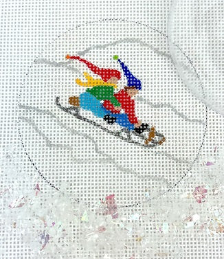 Kate Dickerson Needlepoint Collections Round with Clear Dome and Confetti Kids Sledding Downhill Needlepoint Canvas