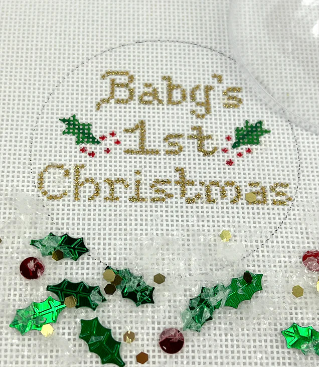 Kate Dickerson Needlepoint Collections Christmas Ornament with Clear Dome Cover and Confetti Babys First Christmas with Holly Gold Letters Needlepoint Canvas