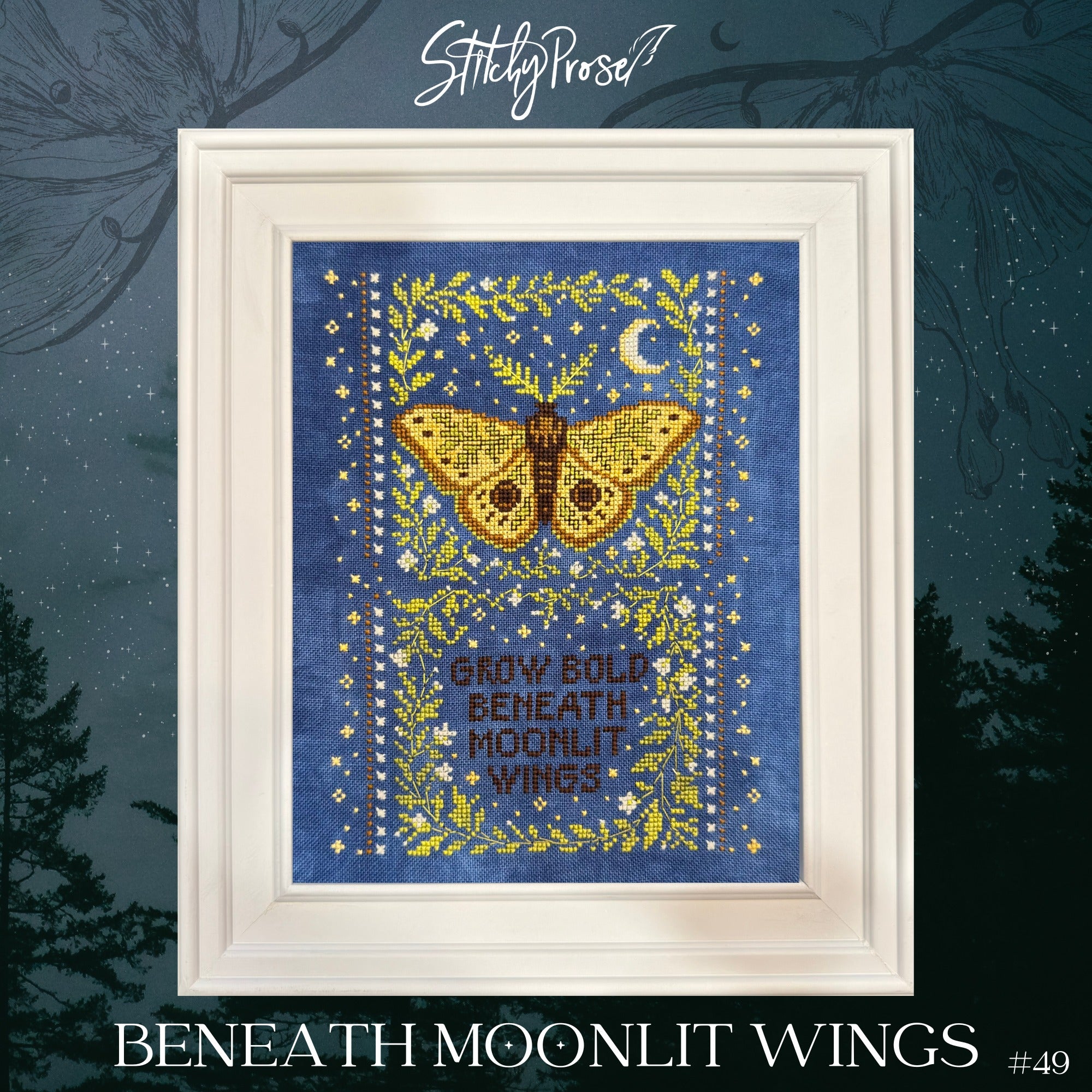 Framed cross stitch of a golden moth framed by leafy vines, stars, and a crescent moon on a deep blue background, with the phrase “Grow Bold Beneath Moonlit Wings” centered at the bottom.