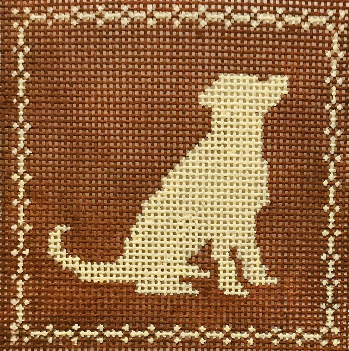 The Plum Stitchery Right Facing Sitting Lab Silhouette- Tan On Brown Needlepoint Canvas