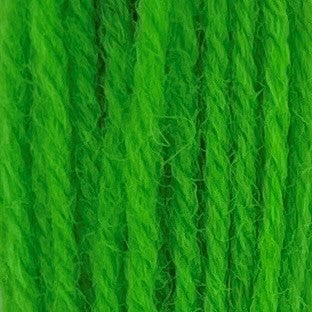 Close-up of bright neon‑green crewel wool thread with a soft, fuzzy texture and tightly twisted strands.
