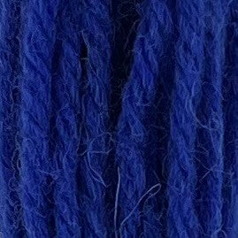 Close-up of cool neon-blue crewel wool thread with a soft, fuzzy texture and tightly twisted strands.
