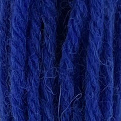 Close-up of cool neon-blue crewel wool thread with a soft, fuzzy texture and tightly twisted strands.