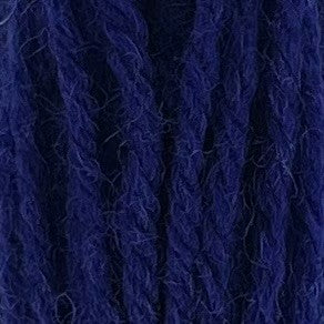 Close-up of hot neon blue tapestry wool thread with a soft, fuzzy texture and tightly twisted strands.