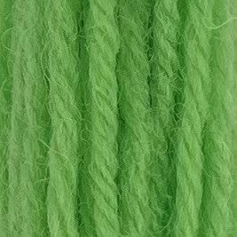 Close-up of sherbert mint tapestry wool thread with a soft, fuzzy texture and tightly twisted strands.
