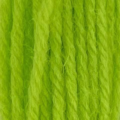 Close-up of sherbert green tapestry wool thread with a soft, fuzzy texture and tightly twisted strands.