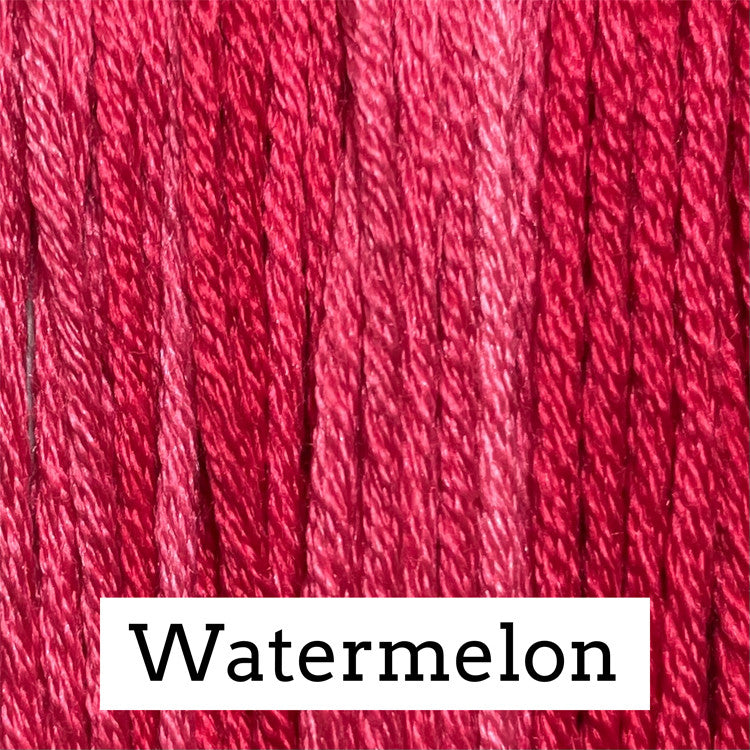 Close-up of bright red silk embroidery floss with subtle pink and crimson variegation, labeled “Watermelon.”