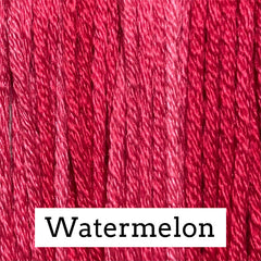Close-up of bright red silk embroidery floss with subtle pink and crimson variegation, labeled “Watermelon.”