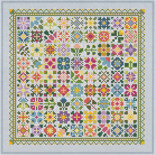 Colorful cross stitch made up of many small floral quilt‑block designs arranged in a mosaic grid with a decorative border.