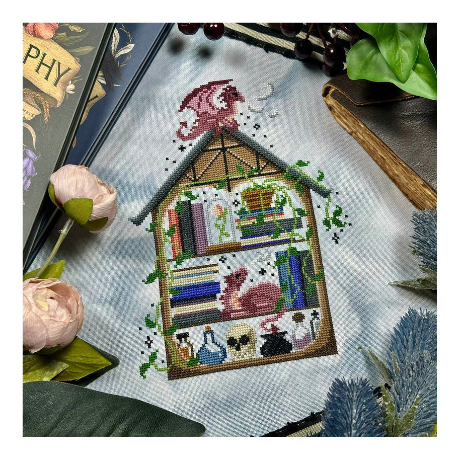 The Stitch Crypt House of Book Dragons Cross Stitch Pattern