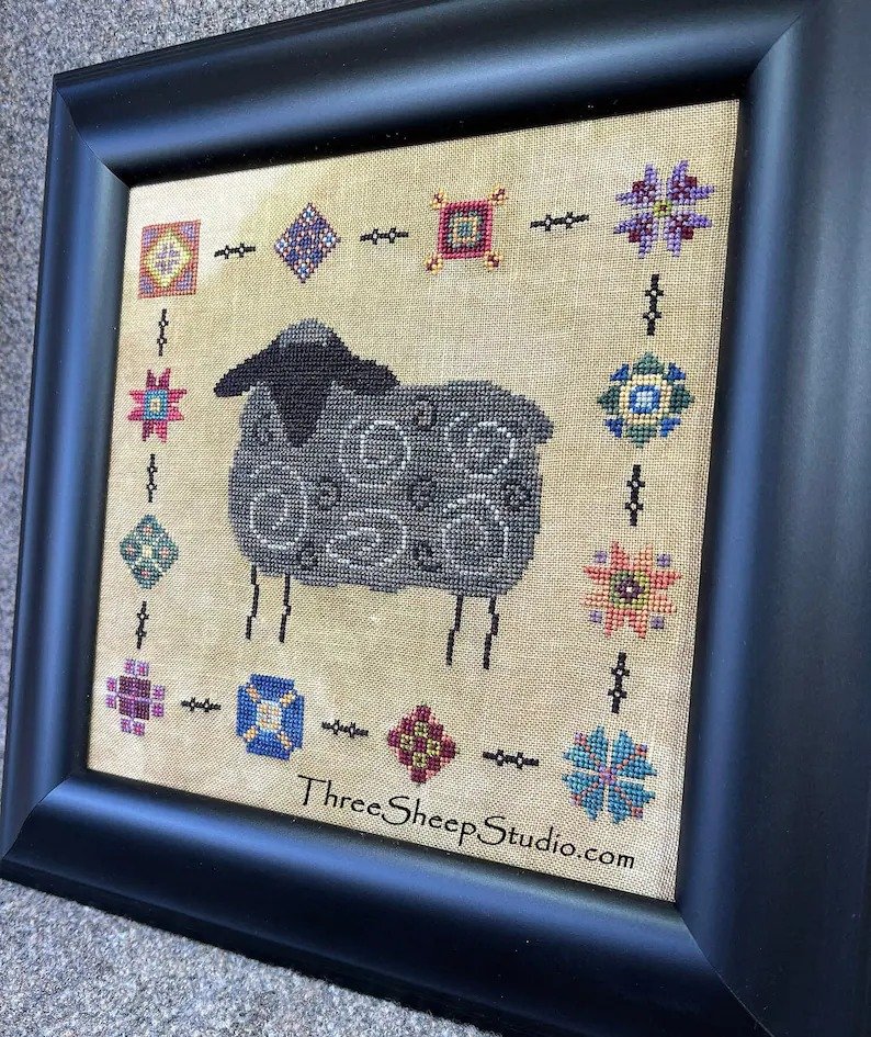 Three Sheep Studio Wrapped in a Quilt The Black Sheep Cross Stitch Pattern